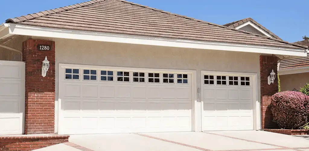 Residential garage door repair service for a double garage door in Birmingham, AL