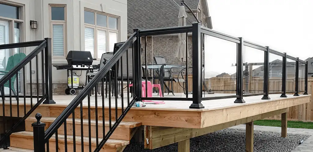 Handrail installation on a deck staircase for safety and code compliance in Birmingham, AL