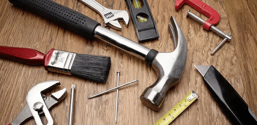 Handyman tools laid out for home repair and maintenance work in Birmingham, AL